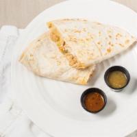Quesadilla · 10 in tortilla folded in half w/ melted cheese & choice of meat, lettuce, tomato & sour cream.