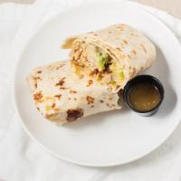 Burrito · 12 in tortilla w/ choice of meat, beans, lettuce, tomato, cheese & sour cream.