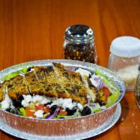 Joe'S Grilled Chicken Salad · Romaine, Iceberg Lettuce Mix, Chicken, Tomatoes, Black Olives, Onions Topped W/ Feta Cheese