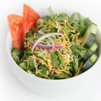 House Salad · Romaine, cucumber, tomato, red onion, with shredded cheddar cheese.