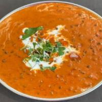 Daal Makhani · Lentils, beans, and tomatoes are blended into a thick buttery stew