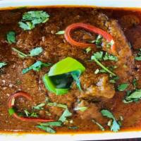 Kadhai Lamb · Cooked with onion, bell pepper and tomatoes in Indian spices & paste