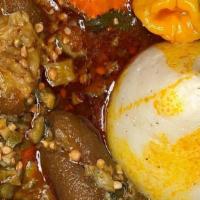 Banku And Okro Soup · Corn dough and cassava mixed with soup