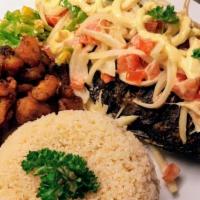 Attieke, Fish With Fried Plantain · Couscous made from ground cassava . An Ivorian delicacy.