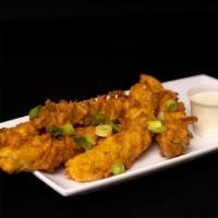 Fried Pickle Spears · Deep-fried zesty pickle spears in our special blend batter with a side of ranch. with appeti...