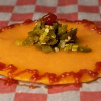 Torcheddar · Cheddar melted on top of a corn tortilla. served with a side of diced jalapenos and picante ...