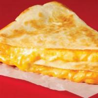 Kids Quesadilla · Flour tortilla, Cheddar Cheese with your choice of Chicken or Ground Beef.