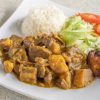 Kids Meal · For kids seven and under. Choose between curry chicken and brown stew chicken.