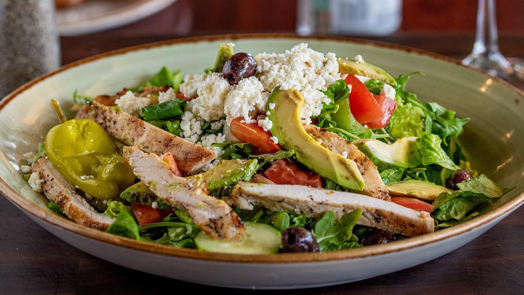 Chicken Avocado Salad · Grilled chicken, romaine lettuce, sliced avocado, arugula, cucumber, Kalamata olives, roma tomatoes, feta cheese and pepperoncini, served with honey mustard dressing.