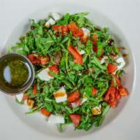 Arugula Caprese Salad · Sliced roma tomatoes, fresh basil, fresh mozzarella, drizzled with extra virgin olive oil an...