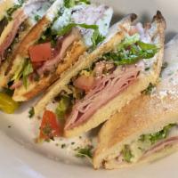 Italian Deli Sandwich · Soppressata salami, mortadella, ham, provolone cheese, Romaine lettuce, red onions, Roma tom...