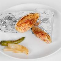 Trinity'S Burrito · Your choice of meat with rice and beans on a flour tortilla. Comes with lettuce, tomato, sou...
