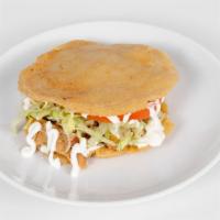 Gordita · Filled with beans your choice of meat, lettuce, tomato, sour cream, and cheese.