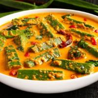 Okra Masala  · Okra cooked in onion sauce and spices.