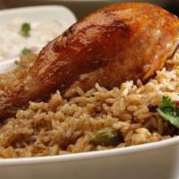 Madurai Chicken Biryani  · chicken marinated in authentic Tamil aromatic spices and cooked with basmati rice.