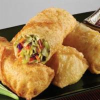 Vegetables Spring Roll · Deep-fried rolled up with cabbage, carrots, celery.