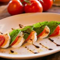 Caprese Salad · (Entrée) Fresh sliced Roma tomatoes, fresh basil and fresh mozzarella drizzled with Sicilian...