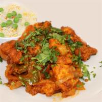 Chilli Chicken · Stir Fried Chicken in green chilli , red chilli and finished with spices.