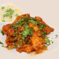 Chilli Chicken · Stir fried chicken in green chilli, red chilli and finished with spices.