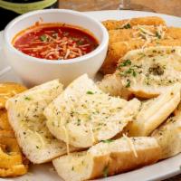 Paesano Platter · Mozzarella sticks, toasted ravioli and garlic bread. Add cheese for an additional charge