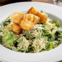 Caesar Salad · Romaine lettuce tossed with Mario’s Caesar dressing, topped with Parmesan cheese and garlic ...