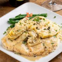 Chicken Or Veal Piccata · Sautéed in lemon butter sauce with capers and artichoke hearts. Served with angel hair pasta...