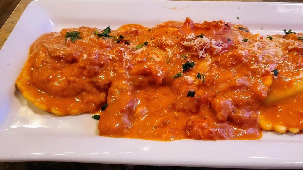 Cheese Ravioli · Tossed with your choice of sauce: Mario’s signature tomato cream, marinara or meat sauce. Add Meatballs, Sausage or Chicken for an additional charge