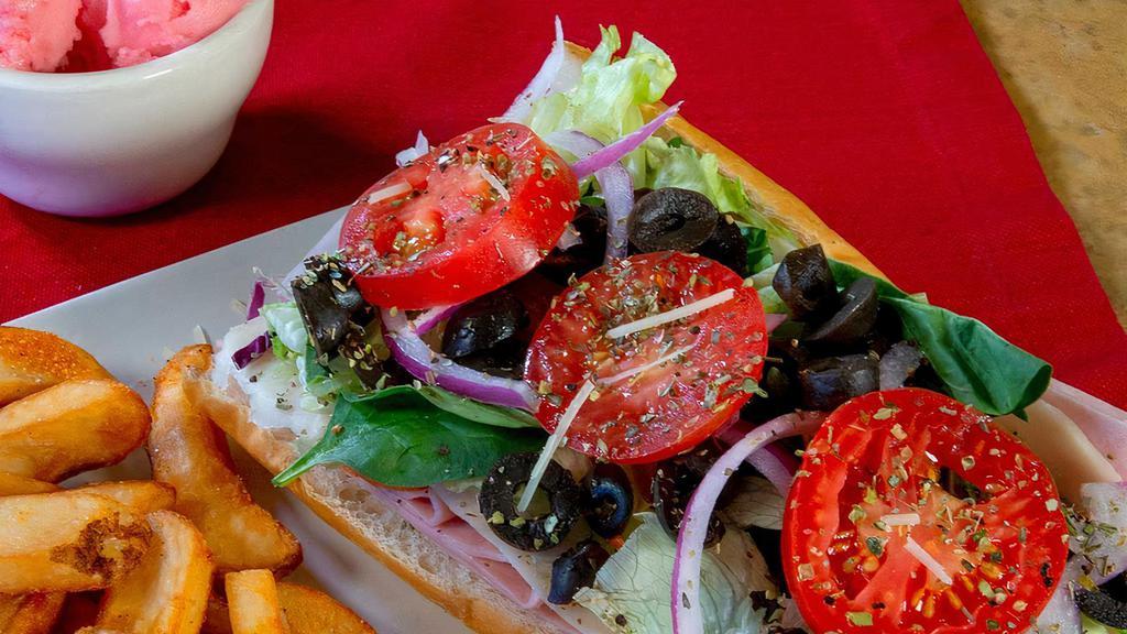 Italian Sub · Ham, salami, pepperoni and provolone cheese topped with lettuce, tomato, black olives, red onions and oil and vinegar dressing