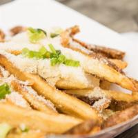 Truffle French Fries · Hand-cut French fries. Truffle oil Parmesan cheese. Green onions.