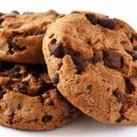 Freshly Baked Cookies · Three small, freshly baked cookies.