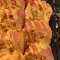 Super Crunchy Roll · Tempura shrimp, spicy crabmeat, crunch wrap with soy paper.