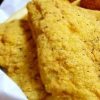 Catfish Basket · Hand-Breaded catfish. Served with fries, Cole slaw and hushpuppies.
