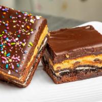 Brookie · layer of brownie, Oreo ®, chocolate chip cookie dough, and chocolate ganache frosting