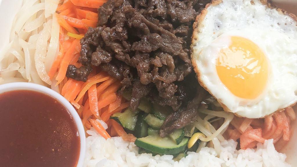 Bulgogi Bibimbob 불고기 비빔밥 · Rice topped with marinated beef bulgogi,onion,carrot,bean sprouts,radish,zucchini,a fried egg and red pepper paste sauce.