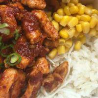 Spicy Chicken Rice Bowl 닭갈비 · Rice with spicy chicken breast, sliced cabbage,corn, green onion and soy sauce.