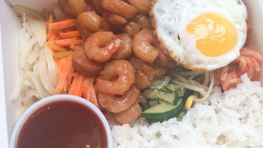 Shrimp Bibimbob 새우 비빔밥 · Rice topped with marinated shrimp,onion,carrot,bean sprouts,radish,zucchini,a fried egg and red pepper paste sauce.