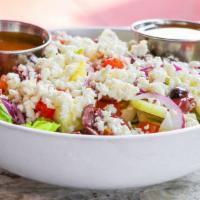 Team Greece · Romaine, red onions, Kalamata olives, cucumbers, tomatoes, feta cheese tossed in herb-vinaig...