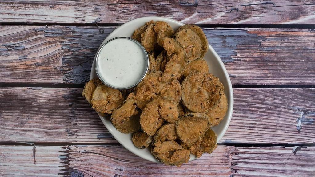 House-Made Fried Pickles* · with garlic buttermilk ranch dipping sauce.