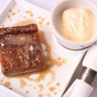 Bread Pudding · Savory bread mixed with bananas. Served with ice cream and chocolate drizzle.