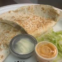 2) Quesadillas · Any choice of meat. (Beef, spiced pork, chicken.)
Available Corn Quesadilla too. (maseca)