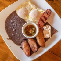 Desayuno Chapin · (Guatemalan breakfast) 2 fried eggs topped with homemade 