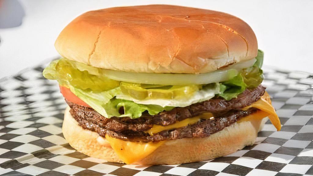 Double Double Burger · American cheese, mustard, lettuce, tomatoes, onion, and pickles.