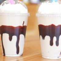Chocolate Shake · Topped with whipped cream.