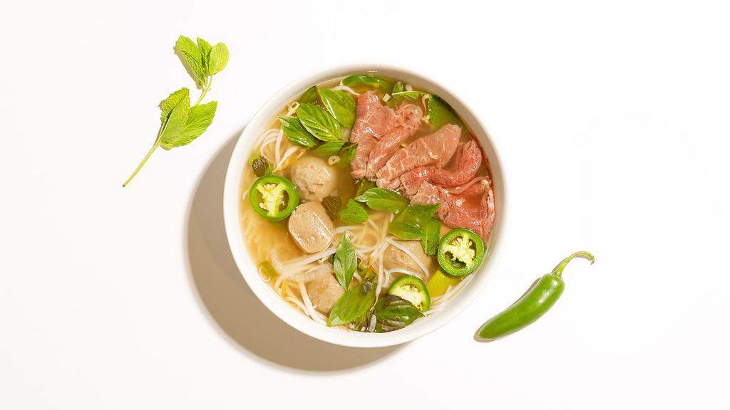 Combination Pho · Ribeye with beef meatballs with rice noodles and house broth.