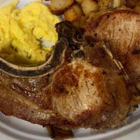Pork Chop · grilled porkchop served with 2 eggs, pancakes or French toast & home grilled potatoes