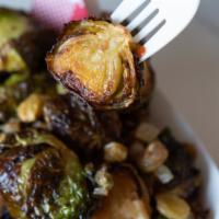 Sicilian Brussels Sprouts · Brussels sprouts fried mixed with balsamic vinegar, shallot, garlic, caper, & golden raisin....
