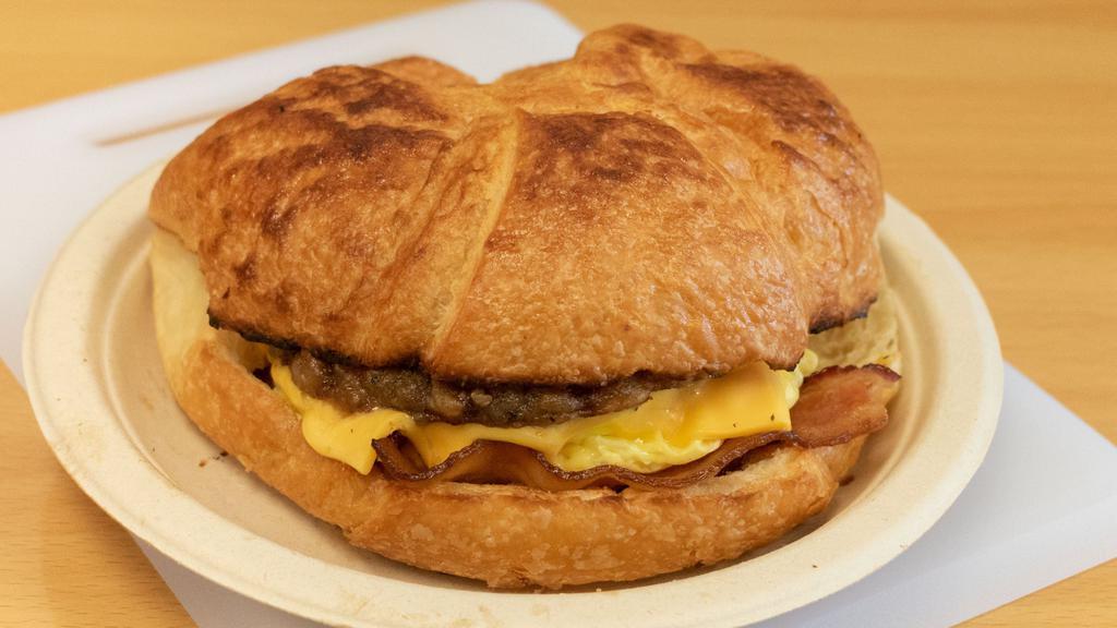Bacon, Sausage, Egg & Cheese Croissant · We freshly make it when you order.