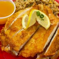 Lemon Chicken · Ginger marinated chicken breast and lemon sauce. Served with steamed white or whole grain ri...