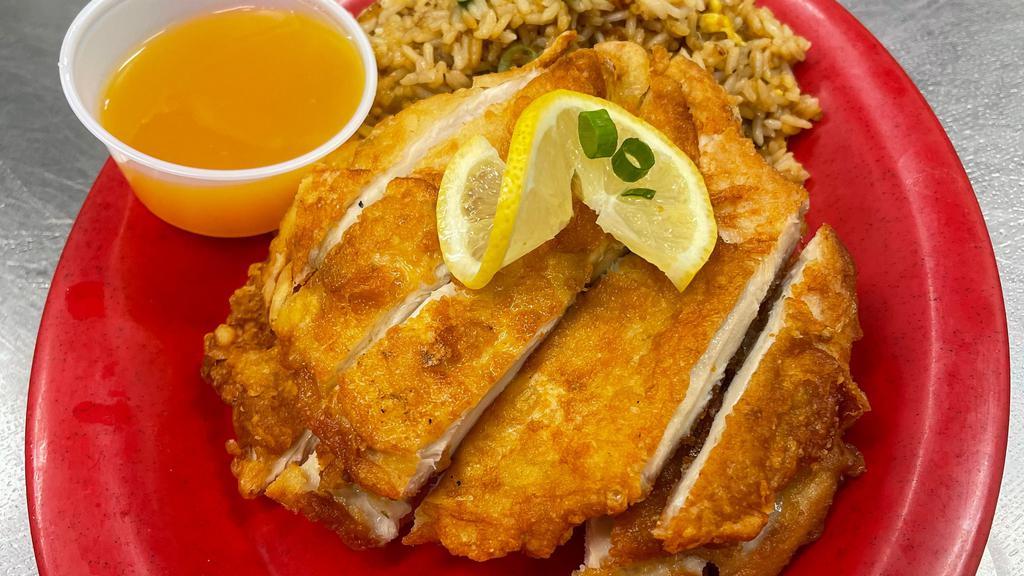 Lemon Chicken · Ginger marinated chicken breast and lemon sauce. Served with steamed white or whole grain rice and soup.