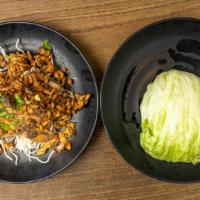 Chicken Lettuce Wrap · Minced chicken, onion, shitake mushrooms, water chestnut, scallions, honey soy sauce with le...